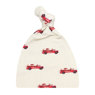 Lou Lou and Company Marshal knit top knot baby hat with soft, cozy fabric and stylish design for infants.
