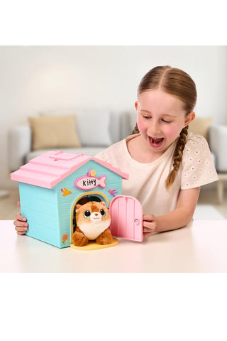 Little Live Pets™ Kitty’s Home Minis with Buildable House
Child holding a toy pet house with a small animal peeking out, on a light-colored surface.