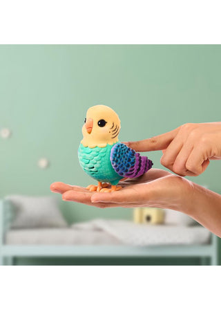 Little Live Pets™ My Really Real Bird Interactive Bird Toy
Colorful bird-shaped toy held in a hand against a light green background