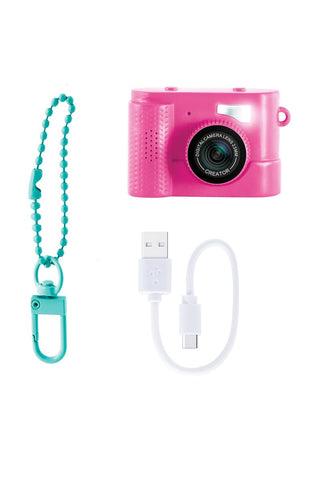 Photo Creator Mini Camera for Kids
Pink digital camera with USB cable and lanyard on a white background