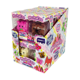 MushyKinz OG Premium Taba Squishy Collectible
A boxed set of MushyKins Series 1 collectible plush toys in a clear plastic display box with a colorful printed outer package. Visible figures include a pink pig, a brown bear, and a cream-colored plush, with character graphics and the MushyKins branding on the box.