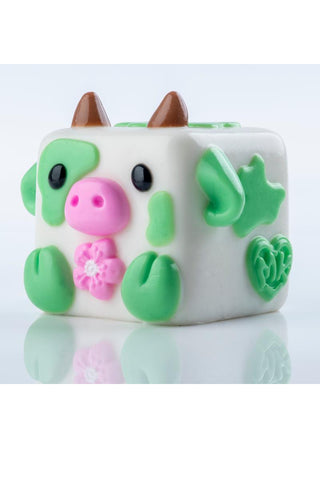 MushyKinz OG Premium Taba Squishy Collectible
Cute animal-shaped cube with green, pink, and brown colors on a white background