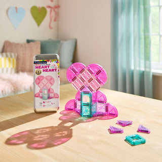 microMAGS Heart to Heart 26-Piece Travel Set
Pink and teal heart-shaped building blocks on a table with packaging in the background.