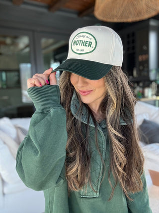Vintage Mother Canvas Patch Hat in green and cream, featuring a classic design and embroidered patch by Mother Hats.