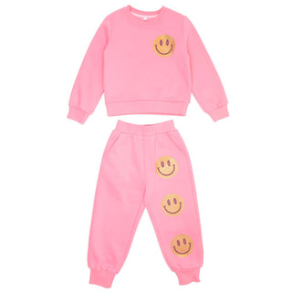 Mini Dreamers Naomi Crystal Smiley Face Sweatshirt and Sweatpant Set
Pink sweatshirt and pants set with smiley face designs on a white background