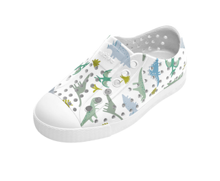 Native Jefferson Print Shoes - Shell White / Flux Alpine Dine White sneaker with dinosaur pattern on a white background