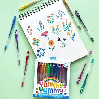 Ooly Yummy Yummy scented glitter gel pens set of 12 with colorful flower-themed designs