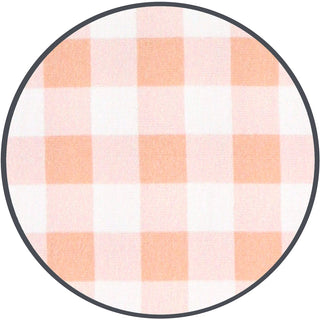 Peach gingham Lou Lou and Company Evie swaddle blanket with circular pattern, soft and cozy for infants.