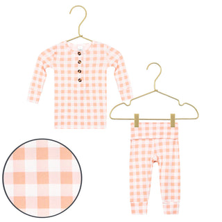 Lou Lou and Company Evie outfit set with peach gingham top and matching bottoms, perfect for stylish and comfortable toddler wear.