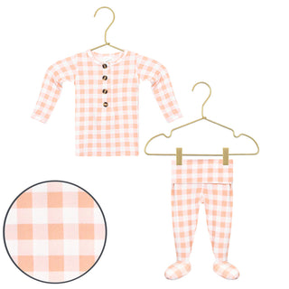 Lou Lou and Company Evie outfit set with peach gingham top and matching bottoms, featuring a comfortable, stylish baby clothing ensemble.