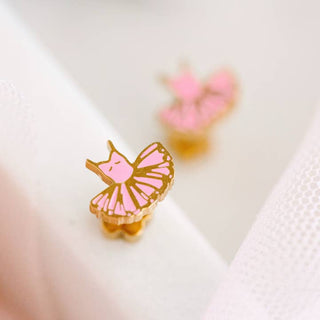 Pierced Co. Tutu Earrings 
Butterfly-shaped earrings with pink wings and gold bodies on a white background