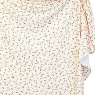 Lou Lou and Company Swaddle Blanket - Lottie
Floral patterned fabric with small pink flowers on a white background