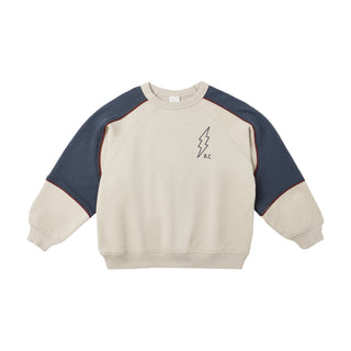 Play by Rylee & Cru Paneled Sweatshirt - Stone Beige and navy sweatshirt with a small graphic on a white background