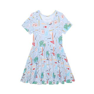 Posh Peanut Steve Ruffled Twirl Dress Children's dress with colorful pattern on a white background