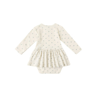 Quincy Mae Pointelle Skirted Bodysuit - Blue Ditsy
White baby dress with long sleeves on a white background