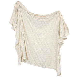 Lou Lou and Company Quincy swaddle blanket featuring soft fabric and gentle design, perfect for cozy newborn swaddling.