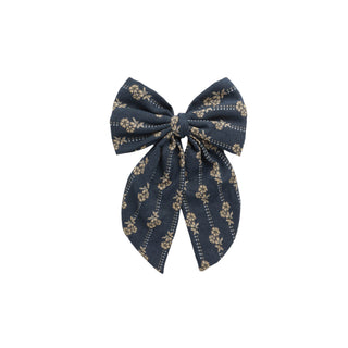 Rylee & Cru Oversized Bow - Vintage Bloom Navy blue bow with floral pattern on a white background