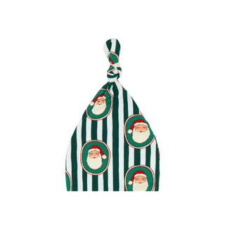 Green Santa Claus Lane newborn hat by In My Jammers featuring red and white stripes and festive holiday design.