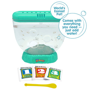 Schylling  The Sea-Monkeys Ocean Volcano Product packaging for a pet starter kit with text 'World's Easiest Pet!' and 'Made in the USA' labels.