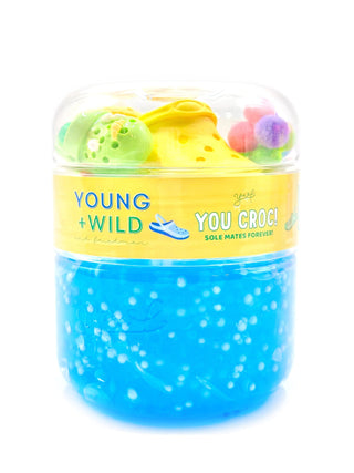 Bright green slime titled "You Croc My World" from Young Wild and Friedman, with a glossy, gooey texture.