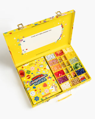 Super Smalls Super Entrepreneur Bead Kit Colorful bead kit with open lid showing various beads inside, on a white background.