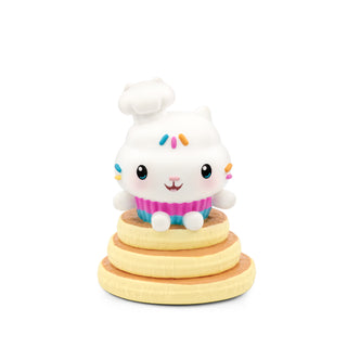 Tonies Character - Dreamworks: Gabby's Dollhouse: Cakey Cat Toy figure of a white character with colorful accents on top of wooden rings against a white background
