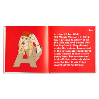 Taylor Swift Legends Alphabet Hardcover Book
Open book with a red cover featuring an illustration of a person and text on a white background