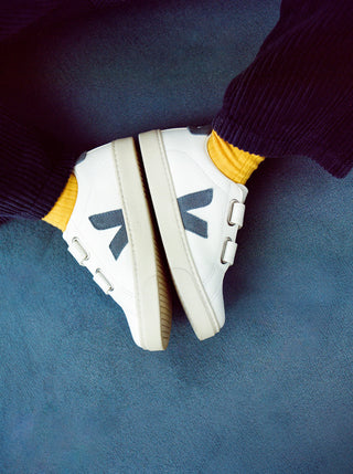 White VEJA Kids Esplar leather sneakers with classic design and white laces, perfect for casual wear and everyday comfort.
