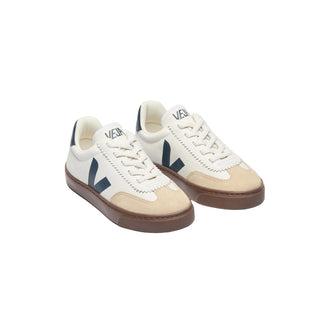 White VEJA Kids Volley sneakers with elastic laces and leather upper, featuring navy and bark accents.