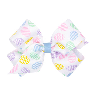 Wee Ones Medium Wee Ones Easter
Egg Printed Hair Bow on Clippie
Colorful hair bow with ice cream cone pattern on a white background