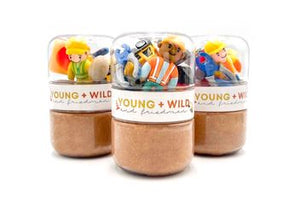 Young Wild and Friedman Grab & Go Dough Jar - Construction 
Three small glass jars filled with colorful toys labeled 'Young & Wild' on a white background.