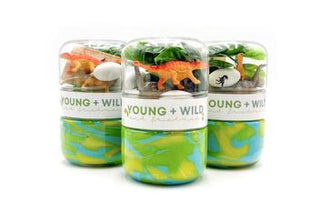 Young Wild and Friedman Grab & Go Dough Jar - Dinosaur 
Three jars labeled 'Young + Wild' with toy dinosaurs and animals on a white background