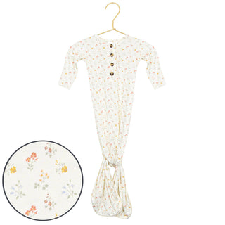 Lou Lou and Company Knotted Gown - Willow
Floral-patterned baby grow on a hanger with a close-up inset showing the pattern.