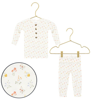 Lou Lou and Company Top and Bottoms - Willow
Floral-patterned baby outfit with top and pants on hangers against a white background.