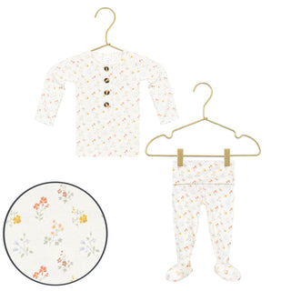 Lou Lou and Company Top and Bottoms - Willow
Floral baby outfit with top and pants on hangers against a white background