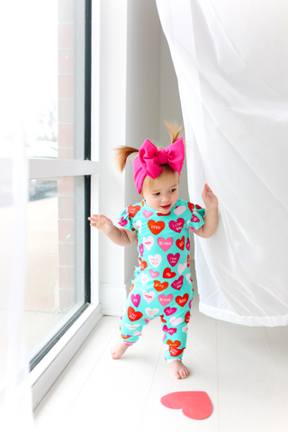 Posh Peanut Valerie Ruffled Capsleeve Basic Romper, Posh Peanut, cf-size-6-9-months, cf-type-romper, cf-vendor-posh-peanut, Conversation Heart, Conversation Hearts, Posh Peanut, Posh Peanut R