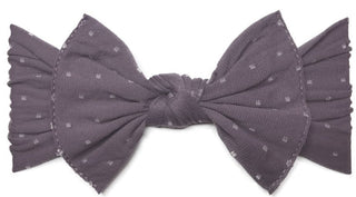 Baby Bling lilac dot patterned knot headband for babies, featuring soft fabric and stylish knot design.