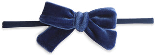 Baby Bling Royal Velvet Bow Skinny Headband featuring a velvet bow on a stretchy headband for infants and toddlers.
