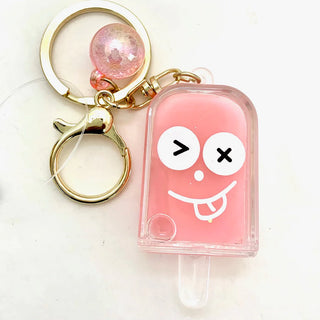 BCMINI Ice Pop Face Emoji charm keychain attached to a keyring, colorful and playful accessory for keys or bags.