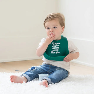 Bella Tunno Dragon Slayer Wonder Bib with colorful dragon design, soft fabric, and adjustable neck for babies and toddlers.