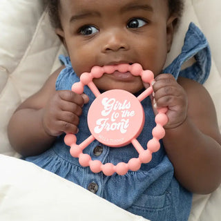 Bella Tunno Girls to the Front happy teether, colorful silicone baby teething toy with smiling face design.