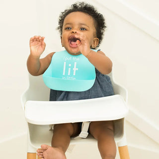 Bella Tunno Lit in Little Wonder bib featuring colorful illustrations and soft fabric, designed for baby feeding protection.