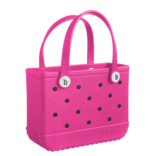 Bogg Bitty Bogg Bag in HAUTE Pink, a stylish pink handbag with a unique design and textured surface.