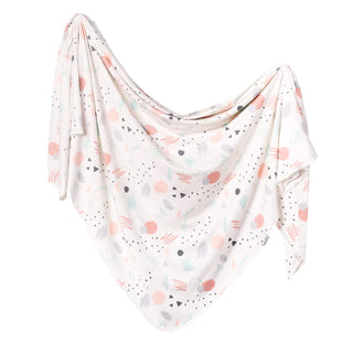 Soft Copper Pearl Bayside Knit Swaddle Blanket with a cozy knit texture, perfect for wrapping and comforting babies.