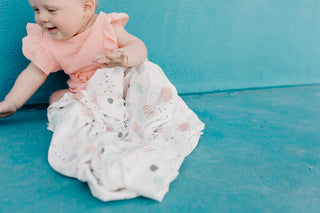 Copper Pearl Bayside Knit Swaddle Blanket featuring soft, breathable fabric in a stylish coastal blue color for newborn swaddling.