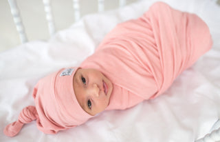Copper Pearl Darling Top Knot Hat in soft fabric with a playful top knot design, ideal for babies and toddlers.