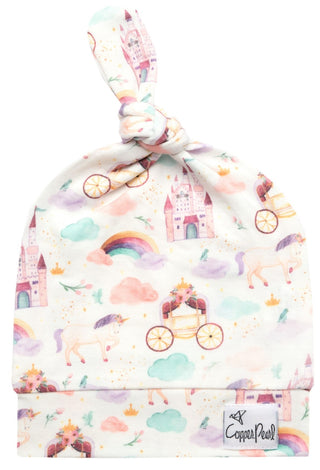Copper Pearl Enchanted Top Knot Hat in copper color, soft knit fabric with a stylish top knot design for babies.