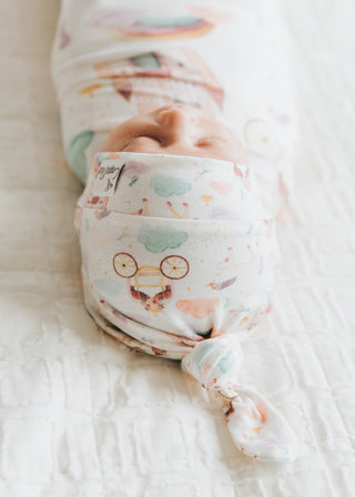 Copper Pearl Enchanted Top Knot Hat in copper color, soft baby hat with a stylish top knot detail, perfect for little ones.