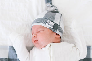 Copper Pearl Hudson top knot hat in soft fabric, featuring a stylish knot design and adjustable fit for babies.