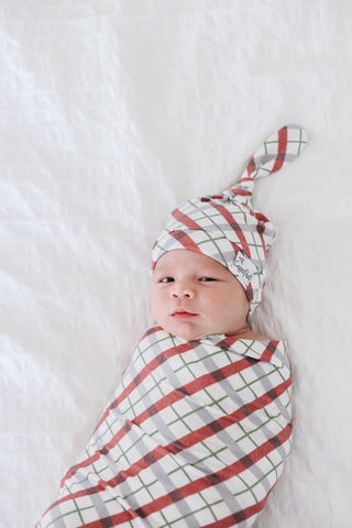 Copper Pearl Jolly Top Knot Hat in soft fabric with a knot detail, designed for infants and toddlers.